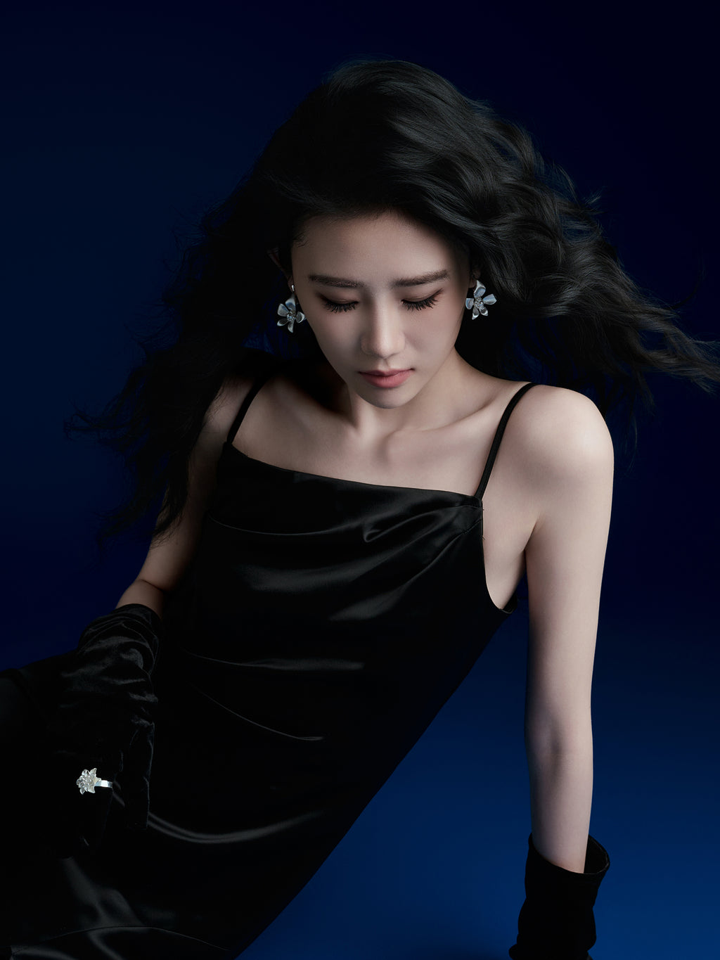 Silver Floral Stud Earrings with Central Pearl Accent