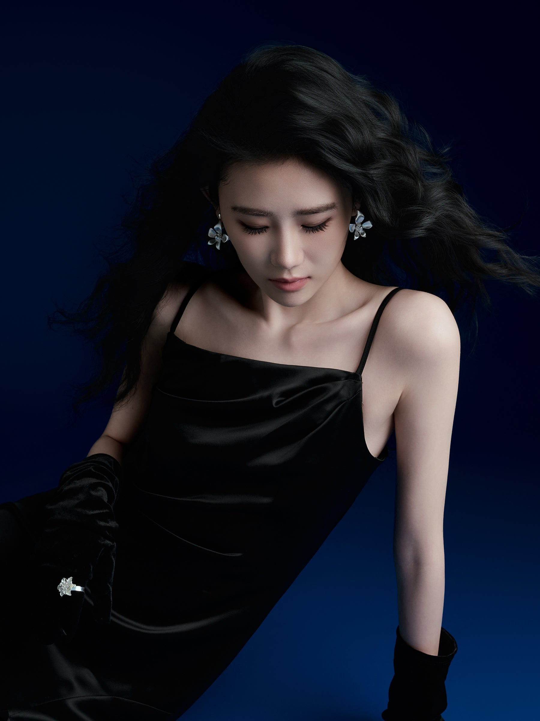 Silver Floral Stud Earrings with Central Pearl Accent