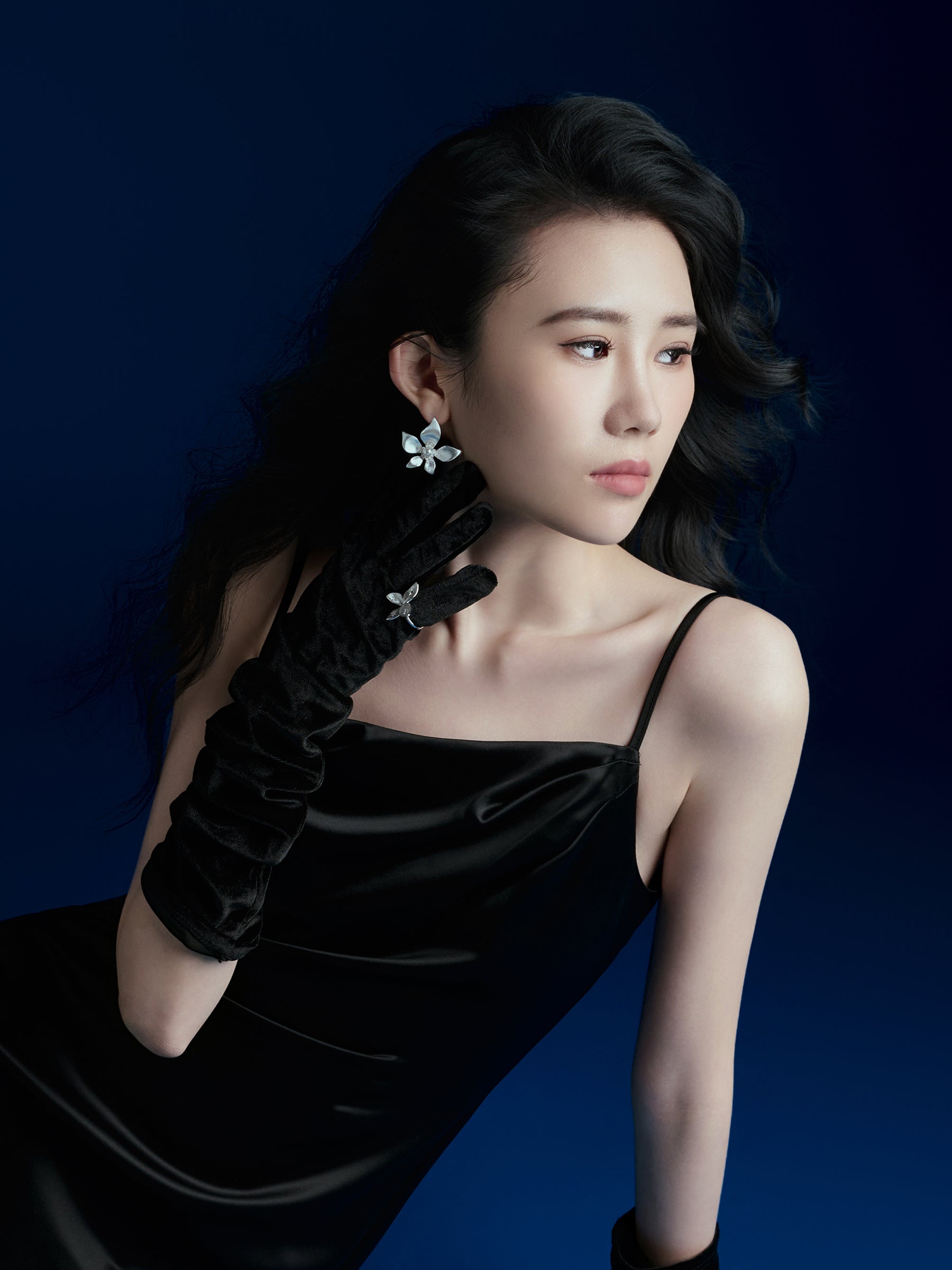 Silver Floral Stud Earrings with Central Pearl Accent