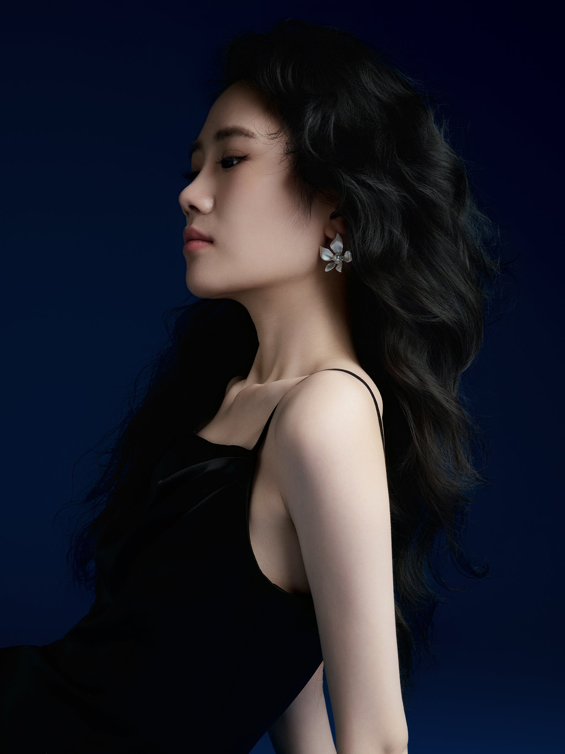 Silver Floral Stud Earrings with Central Pearl Accent