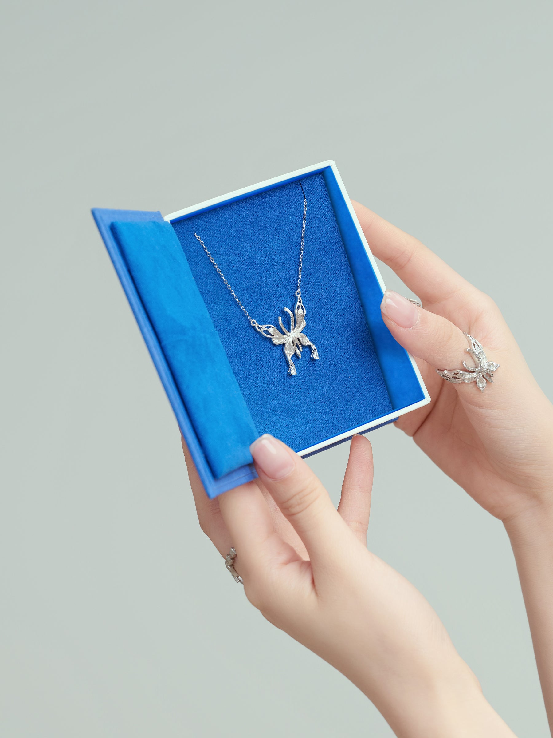 Silver Butterfly Pendant Necklace with Dainty Accents